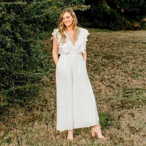 White pleated ruffle jumpsuit